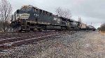 NS 4143 leads the empty oil cans.